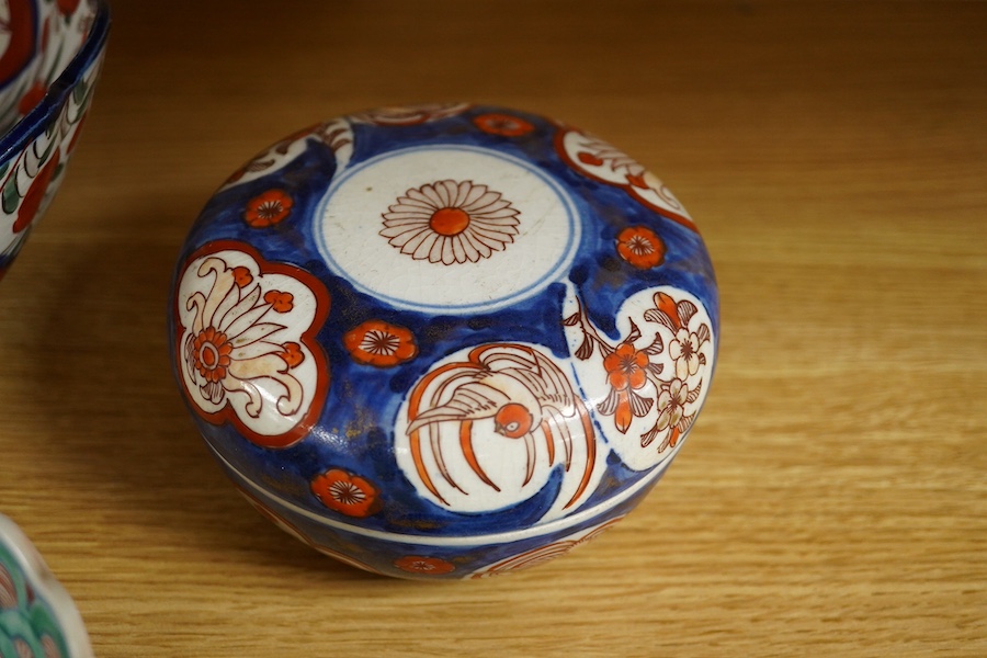 A collection of Chinese and Japanese porcelain to include 'rice grain' bowls, covers & stands and 19th century Japanese Imari, largest 25cm. Condition - mostly fair/good